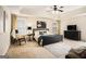 Spacious main bedroom features a ceiling fan, two windows, and carpet at 2750 Brentwood Estates Ct, Cumming, GA 30041