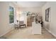 Bright office space with a large window, desk, shelves, and cozy chair at 2750 Brentwood Estates Ct, Cumming, GA 30041