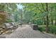 Outdoor patio with a seating area, perfect for enjoying the natural surroundings at 102 Passage Point, Peachtree City, GA 30269