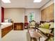 Basement area with furniture, including a couch, chair, and end tables at 102 Passage Point, Peachtree City, GA 30269