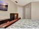 Comfortable bedroom showcasing a decorative dresser, large bed and neutral walls at 102 Passage Point, Peachtree City, GA 30269