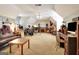 Spacious bonus room featuring neutral carpet and a variety of instruments and furniture at 102 Passage Point, Peachtree City, GA 30269