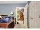 Hallway featuring a neutral color palette and doors leading to functional spaces at 102 Passage Point, Peachtree City, GA 30269