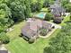 Lovely single-Gathering home with well-manicured lawn, mature trees, and a refreshing pool in a desirable neighborhood at 186 Ashley Dr, Mcdonough, GA 30252
