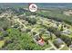 Neighborhood aerial view highlighting the home's location within a quiet, tree-filled community with a mature tree canopy at 186 Ashley Dr, Mcdonough, GA 30252