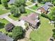 Aerial view of landscaped property, featuring well-maintained lawn and brick house at 186 Ashley Dr, Mcdonough, GA 30252