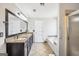 Bathroom features double sinks, granite countertops, tile floors and separate tub and shower at 186 Ashley Dr, Mcdonough, GA 30252