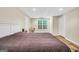 Bedroom with laminate flooring, natural lighting, and a comfortable bed at 186 Ashley Dr, Mcdonough, GA 30252