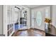 Inviting foyer with tile flooring, leading to an office with French doors at 186 Ashley Dr, Mcdonough, GA 30252