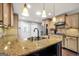Close up on kitchen featuring granite counters, bar seating, updated appliances and ample cabinet space at 186 Ashley Dr, Mcdonough, GA 30252
