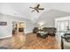 Open-concept living area featuring hardwood floors, and access to the kitchen and front entry at 186 Ashley Dr, Mcdonough, GA 30252