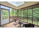 Relaxing sunroom featuring a skylight, screened windows, and outdoor views at 186 Ashley Dr, Mcdonough, GA 30252