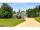 Lovely craftsman home with a long driveway on a well-manicured and landscaped lot at 30 Hollyhock Ln, Covington, GA 30014