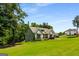 Charming, craftsman home with a lush green lawn and professional landscaping at 30 Hollyhock Ln, Covington, GA 30014