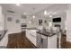 Spacious kitchen featuring granite counters, a center island and stainless steel appliances at 30 Hollyhock Ln, Covington, GA 30014