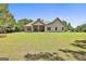 Picture of a serene backyard with expansive green space, perfect for outdoor enjoyment and entertaining guests at 45 Coral Ridge Ct, Palmetto, GA 30268