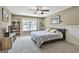 Bedroom with neutral color palette, a bed, and built in shelves at 45 Coral Ridge Ct, Palmetto, GA 30268