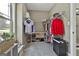 Walk in closet with carpet, a window and multiple clothes racks and shelves for storage at 45 Coral Ridge Ct, Palmetto, GA 30268