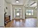 Inviting foyer showcasing hardwood floors, coffered ceilings, and a decorative chest at 45 Coral Ridge Ct, Palmetto, GA 30268