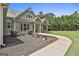 Well-maintained single Gathering home with mature trees and manicured lawn at 45 Coral Ridge Ct, Palmetto, GA 30268