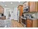 Close up of kitchen with stainless steel appliances and granite countertops at 45 Coral Ridge Ct, Palmetto, GA 30268