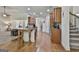 Open kitchen with granite countertops, wood cabinets, and stainless steel appliances at 45 Coral Ridge Ct, Palmetto, GA 30268