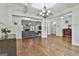 Spacious living area showcasing hardwood floors, decorative columns, and seamless flow at 45 Coral Ridge Ct, Palmetto, GA 30268