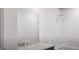 Modern bathroom featuring a sleek shower and vanity with granite countertop at 1208 Trombone Way # 106, Mcdonough, GA 30252