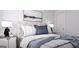 Cozy bedroom with a comfortable bed, decorative pillows, and stylish bedside tables at 1208 Trombone Way # 106, Mcdonough, GA 30252