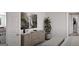 Serene bedroom area, complemented by a wooden dresser, sleek bench and a serene art piece at 1208 Trombone Way # 106, Mcdonough, GA 30252