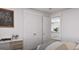 Bedroom featuring a closet, desk, and a view of the upstairs landing at 1208 Trombone Way # 106, Mcdonough, GA 30252