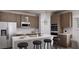 Well-equipped kitchen boasting stainless steel appliances and a center island with seating at 1208 Trombone Way # 106, Mcdonough, GA 30252