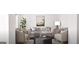 Inviting living room with stylish seating, a decorative ottoman, and a large house plant at 1208 Trombone Way # 106, Mcdonough, GA 30252