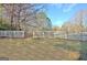 Large fenced backyard offering plenty of space for outdoor activities and recreation at 435 Crabapple Rd, Fayetteville, GA 30215