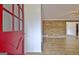 Bright entryway with wood accent wall offers a warm welcome into the beautifully updated home at 435 Crabapple Rd, Fayetteville, GA 30215