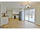 Open kitchen area with stainless steel appliances and a sliding glass door to the deck at 435 Crabapple Rd, Fayetteville, GA 30215