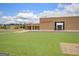 Exterior view of Whitewater High School featuring a well-maintained lawn and modern architectural design at 435 Crabapple Rd, Fayetteville, GA 30215