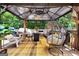 Relaxing gazebo with string lights and comfortable seating at 422 Old Ivy Path, Mcdonough, GA 30253