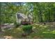 A private backyard featuring a wooden deck ideal for outdoor relaxation and entertainment at 230 Vienna Way, Douglasville, GA 30134