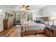 Bedroom showcasing a wooden bed frame, natural light, and a vintage rug on the floor at 230 Vienna Way, Douglasville, GA 30134