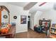 Cozy bedroom with desk, featuring a dresser, hardwood floors, and a ceiling fan at 230 Vienna Way, Douglasville, GA 30134