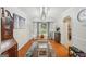 Dining room with wood floors, stylish lighting, and decorative accents at 230 Vienna Way, Douglasville, GA 30134