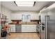 Kitchen featuring stainless steel appliances, stone countertops, and tile floors at 230 Vienna Way, Douglasville, GA 30134