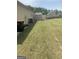 Expansive backyard featuring a shed and ample space for outdoor activities and relaxation at 2635 Lovejoy Crossing Ln, Hampton, GA 30228