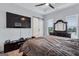 Main bedroom featuring a modern ceiling fan and flat screen TV at 3587 Candler Ct, Hapeville, GA 30354