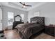 Spacious bedroom with a trey ceiling and dark wood furniture at 3587 Candler Ct, Hapeville, GA 30354