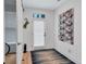 Bright hallway with modern decor and wood floors at 3587 Candler Ct, Hapeville, GA 30354