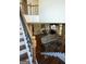 Elegant foyer showcasing a staircase with decorative wrought iron railing at 1010 Forest Overlook Sw Dr, Atlanta, GA 30331