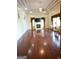 Open living room with hardwood floors, a fireplace, and elegant decor perfect for gatherings at 1010 Forest Overlook Sw Dr, Atlanta, GA 30331
