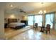 Main bedroom with high ceilings, floor to ceiling windows and ensuite bathroom at 1010 Forest Overlook Sw Dr, Atlanta, GA 30331